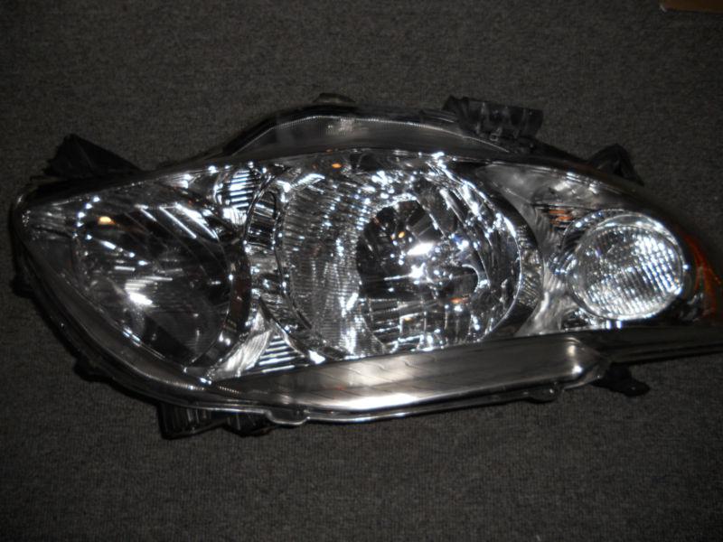 2009, 2010, 2011, toyota corolla headlight assy. passenger side mint condition