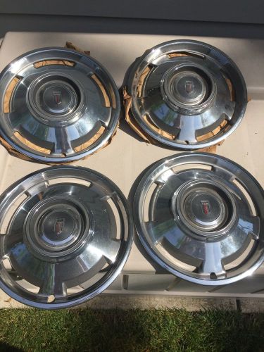 N.o.s. chevy nova hubcaps