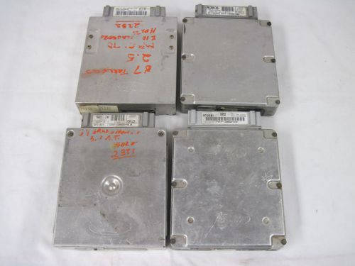 Four ford re-manufactured trans &#034;core&#034; modules: com2; 8kd; air; and e9d1......mz