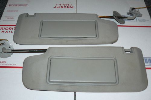 07-2009 saturn aura sun visor set with covered lighted mirrors grey gray