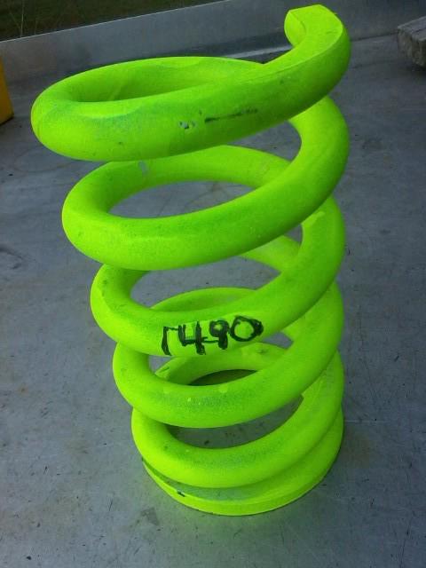 Front spring 1490# 5" dia. 9" height, ground flat one end nascar imca racing