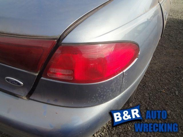 Right taillight for 98 99 00 01 02 escort ~ sdn   back-up lamp in lens 4800477