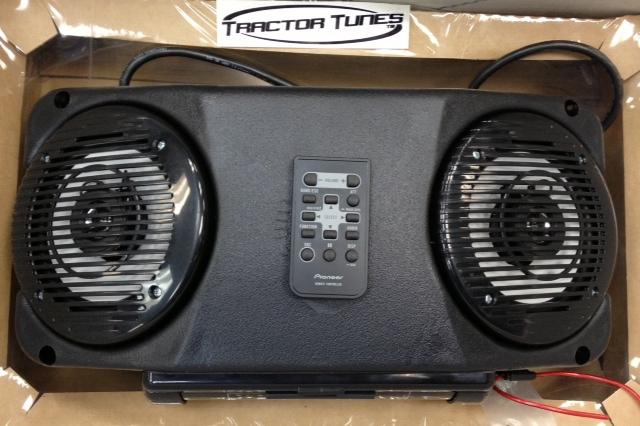 Tractor tunes, roof mount radio console