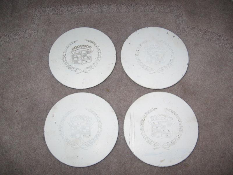 Set of 4 cadillac deville, seville & eldorado wheel center caps