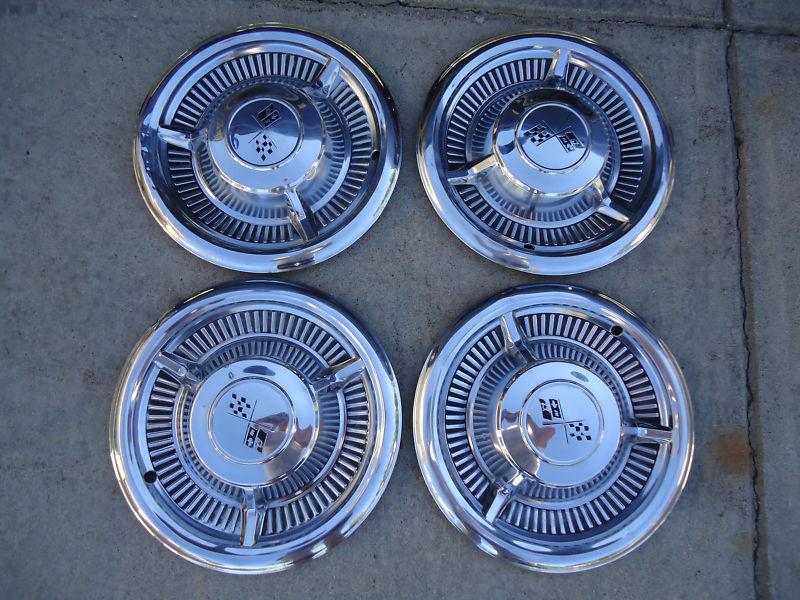 Vintage set "chevrolet corvette 14" hubcaps" look!