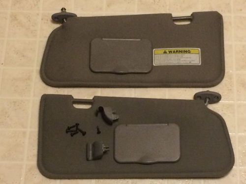 01-07 ford escape sun visors gray with clips and screws (fits:2001 escape)