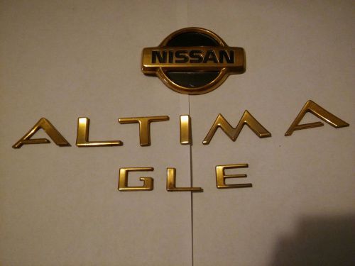 Nissan altima gle rear set trunk lid gold emblem logo badge oem 95 96 97