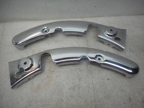 Harley 09-13 touring/flhtc/u stock chrome notched strut covers.