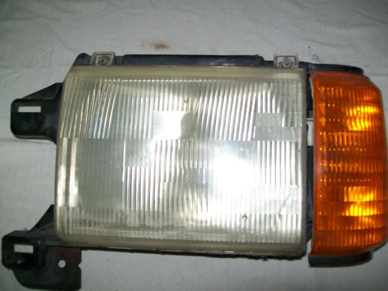 Headlamp assy, 1987 ford f-150 and others, driver side