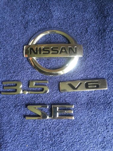 04 05 06 07 08 nissan maxima 3.5 se v6 rear chrome oem emblem logo set