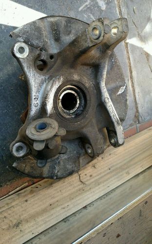 87 mazda rx-7 right  side rear hub 4 lugs knuckle upright assembly, used
