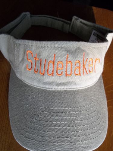 Tan adjustable cotton visor with orange embroidered studebaker - new !