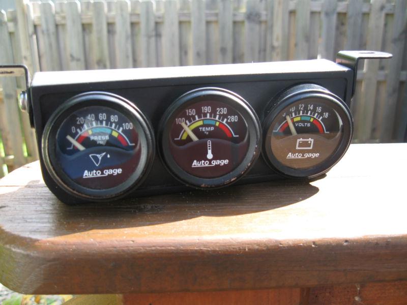 Auto meter model 2391 1-1/2" diameter bezels  electric three-gauge console