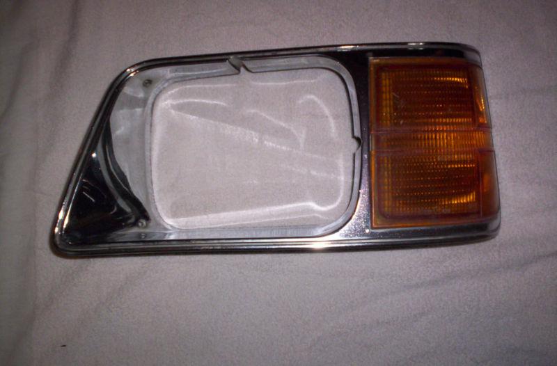 87  plymouth  reliant  left  headlight  chrome  trim  --check this out--
