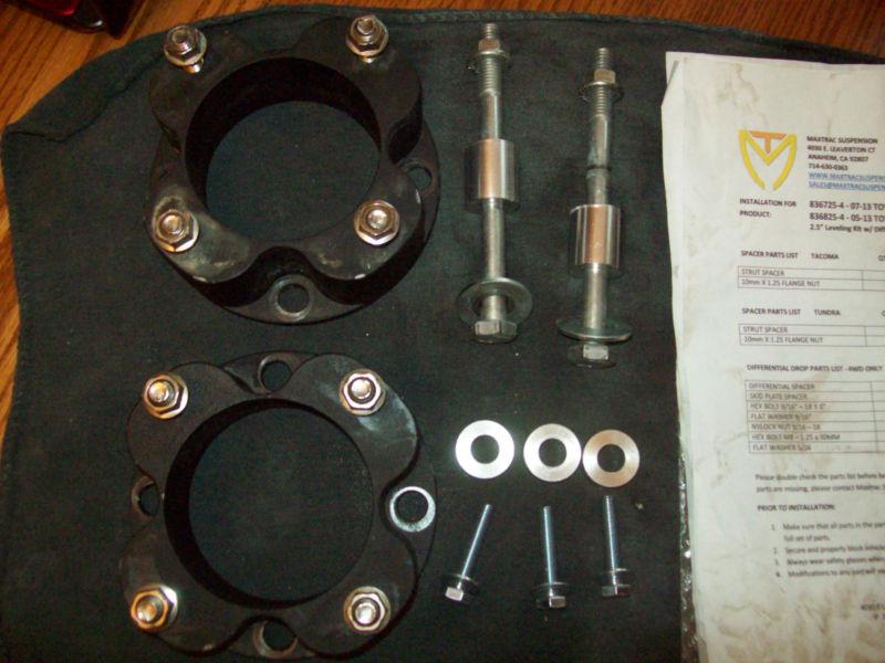 Used carbon steel level lift kit front 2.5" w/ diff & skid plate drop 4wd 4x4