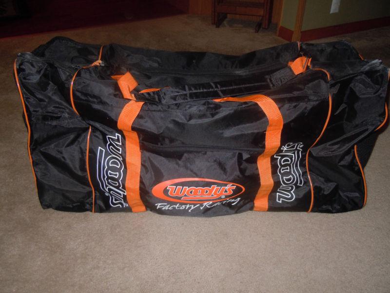 Woodys sponsored snowmobile riding gear bag, xl size, outer boot compartments