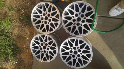 15 inch jeep rims in good condition painted green on the inside