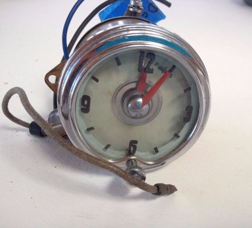 1951 olsmobile 98 clock with wire harness,  nice condition, not tested, w/lamp
