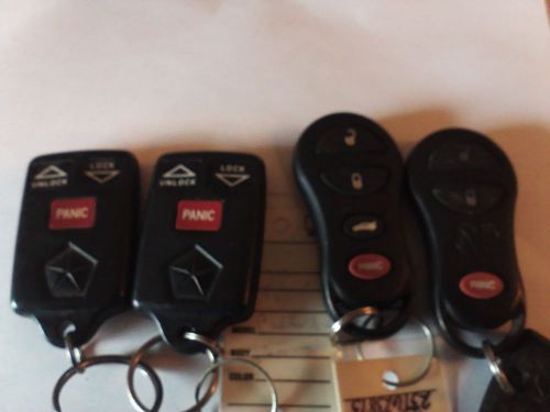 Lot of 4 chrysler dodge jeep remote key fobs 04686366 56045497 04759008