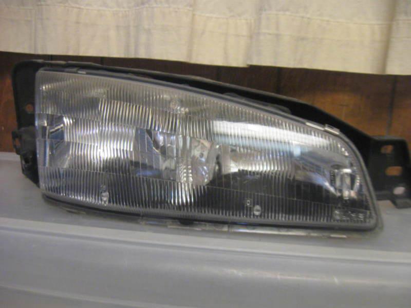 Pontiac grand am passenger right head light 1992-1995 original part rh