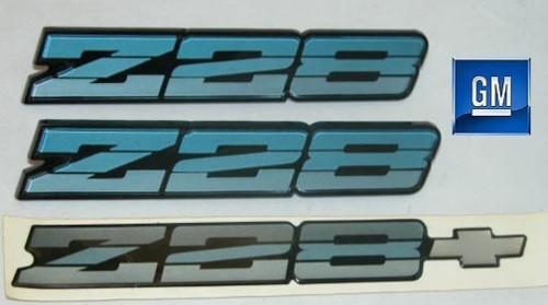 82-92 camaro blue silver z28 emblem set nos gm rare