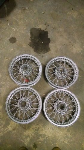 Reconditioned set of four stock 60-spoke stock 14&#034; wire wheels for mg mgb mgb-gt