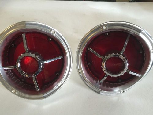 1965 ford falcon tail light assemblys. sae-tsdb-65fn- top. used but nice!