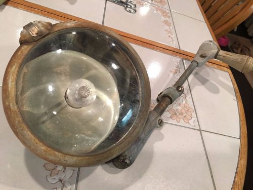 Vintage early ford auto , truck , original spot light with handle and ge bulb ..