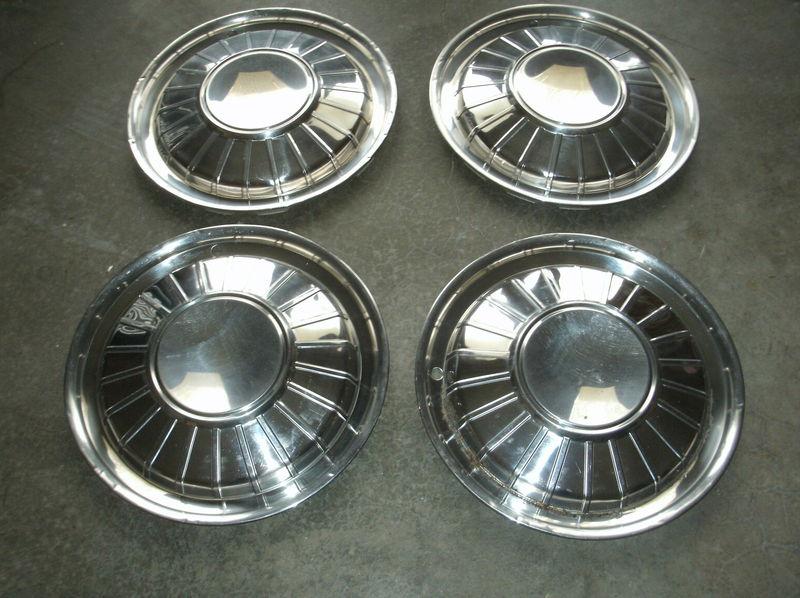 Super deal!!  4 used replacement 1960-1963 ford thunderbird chrome hub caps