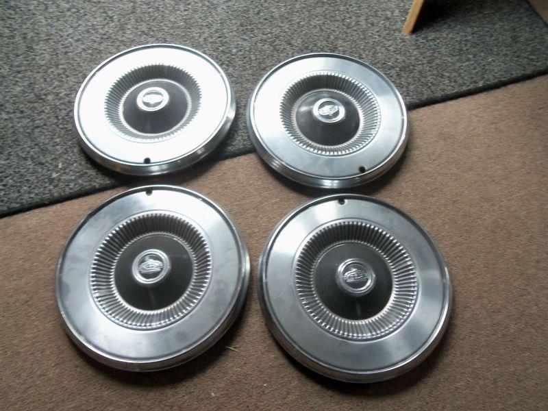 Set 1970 to 1975 vintage ford hub caps 4 four 14  inch 