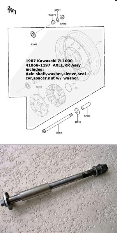 Kawasaki eliminator vulcan concours rear axle w/ both spacers, seal sheild, nut