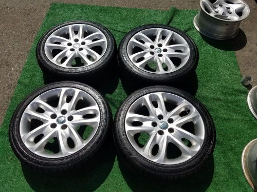 Jaguar 17 inch rims with 95% tread on tires 215 .45.17