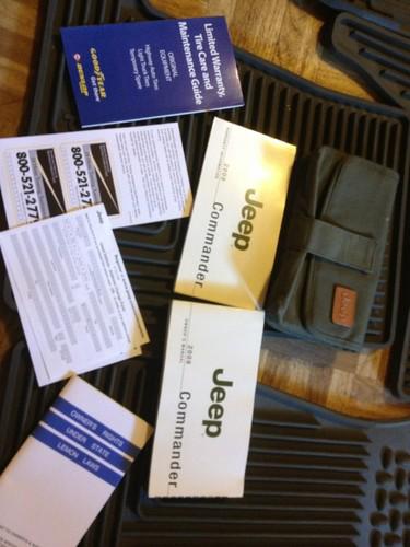 2008 jeep commander owners manual/case cover in great condition!