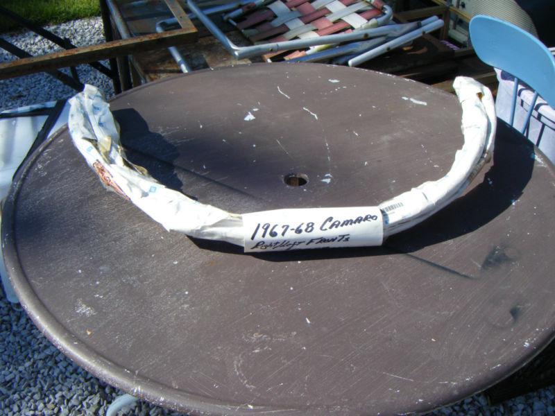 Nos 1967-68 camaro  right/ left  fronts    wheel opening moulding