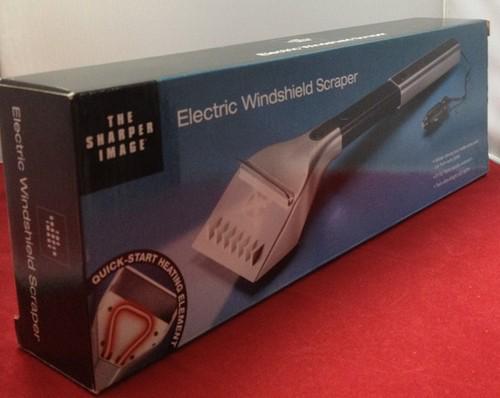 The sharper image electric windshield scraper ice and snow for car new !