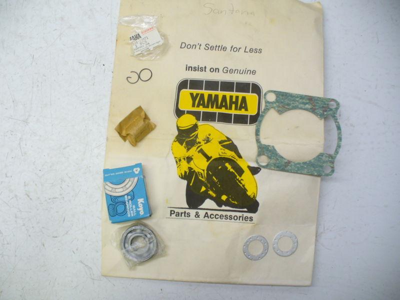 Vintage 70s yamaha shopping bag w/bearing, gasket & other parts.