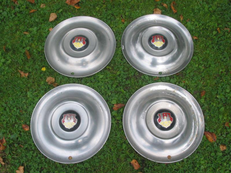  oldsmobile hubcaps set of four....fits 1950-1953 olds