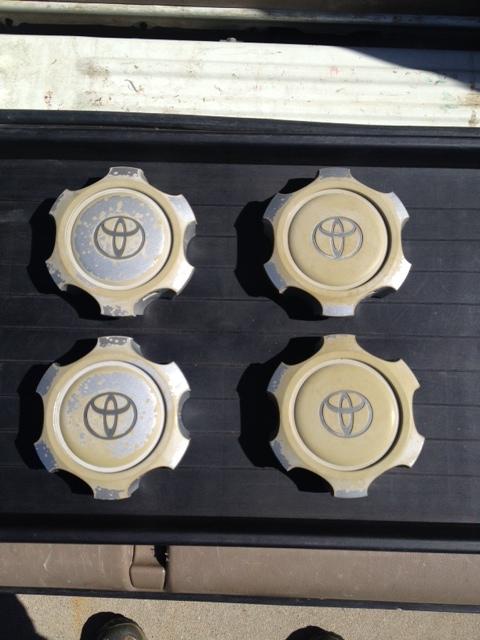Set (4) toyota wheel center caps: fits 4runner (1996-2002) & tacoma (1995-2001)