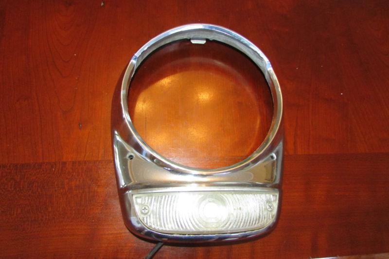 1954 chrysler passengers (rh) side headlight door