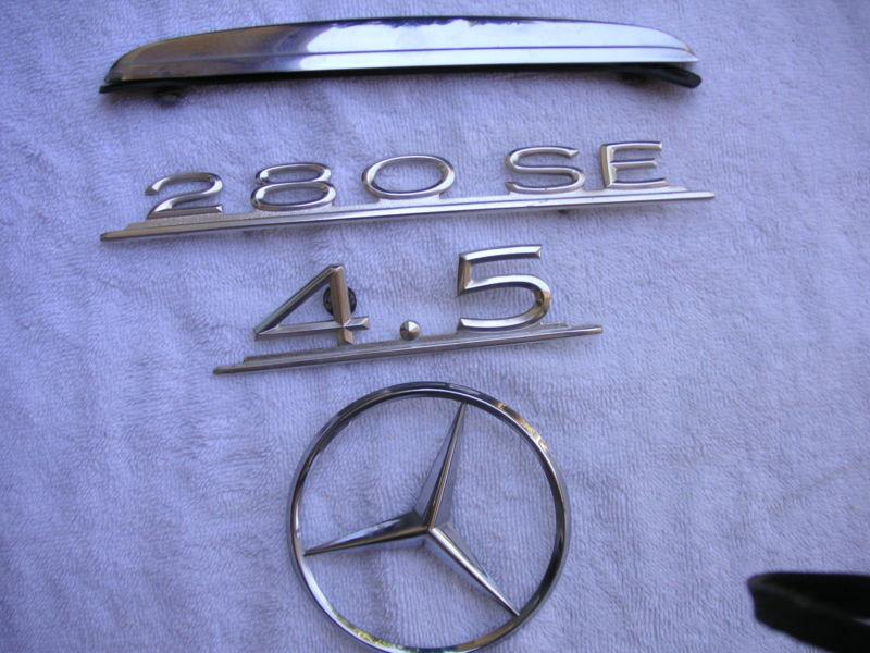 Mercedes benz 280 se, 4,5, & round  trunk badges and emblems very good   my#387