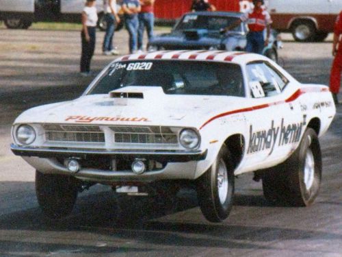 Mopar specialties t-shirts   (with an original ramcharger cuda on front)