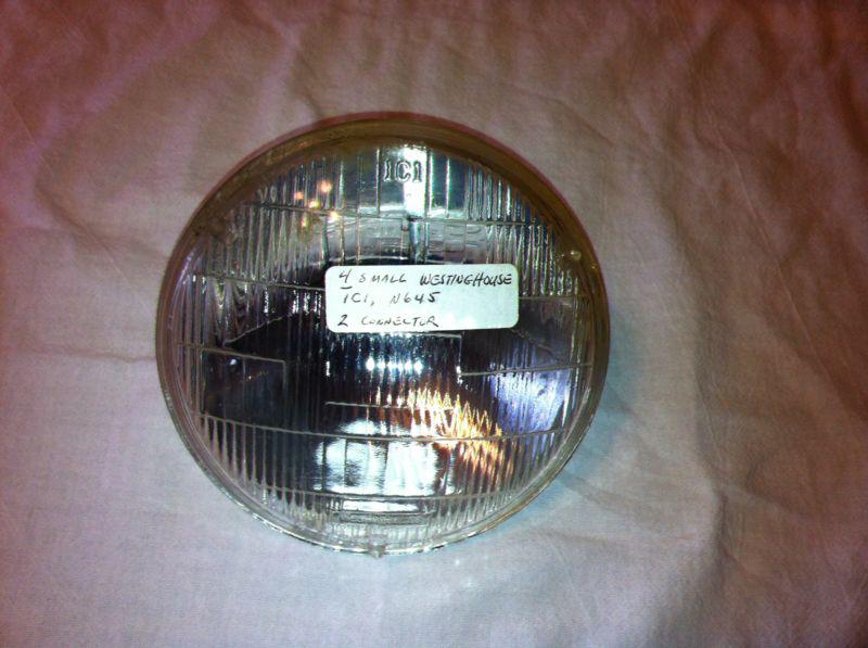 Small bulb headlight , 12 volt, 2 connector, for old cars used.  item:  0936
