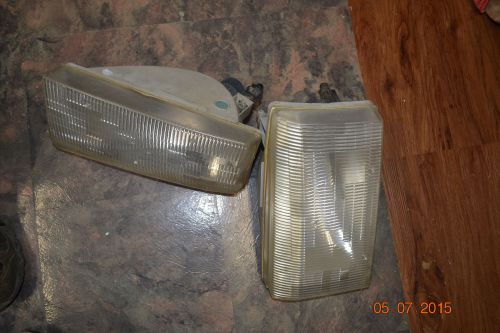 N both front headlights off a 2001 ford f250 super duty 4x4 truck free ship