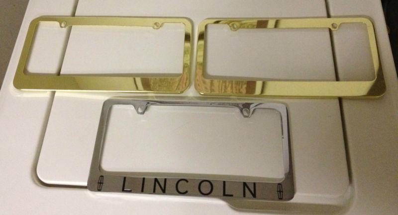Gold license plate frame set & lincoln license plate frame!