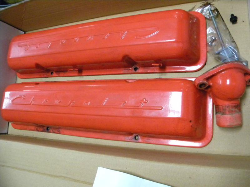 Vintage orange chevrolet valve covers from the 60's off of 1966 chevy pu plus