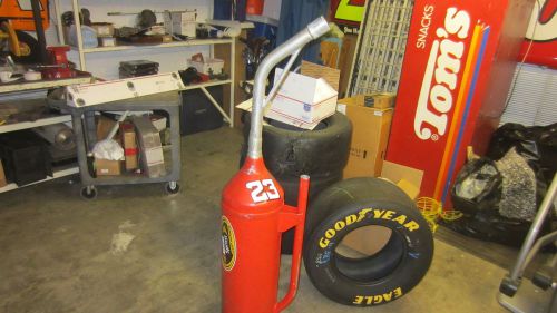 Nascar race used dump can gas fuel pit row road crew stop team ford chevy dodge