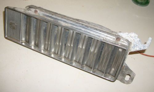 Used 1966 cadillac side marker light assembly, 5957417 lh side, good for spare