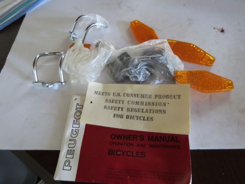 Nos oem peugeot bicycle owners manual and kit lens reflector?? p-001