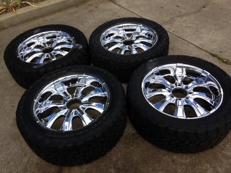 8 lug 24" kaotik wheels with 37"x13.5r24 toyo open country tires