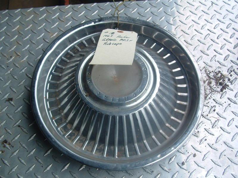1963 pontiac grand prix hubcaps (2)